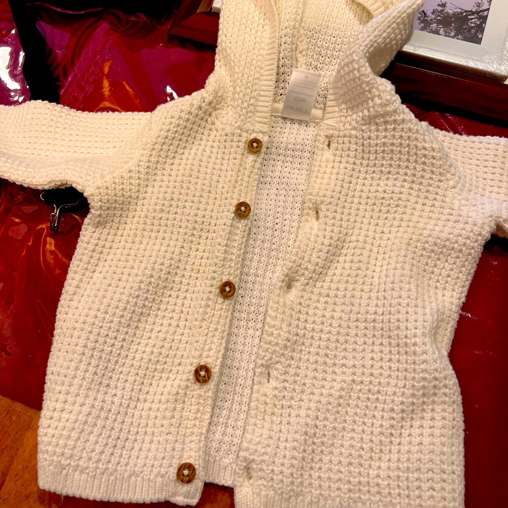 white 12 m sweater